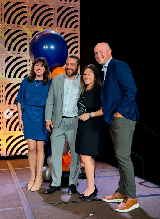 Damian Santiago at the FCXC franchise conference during an industry awards presentation